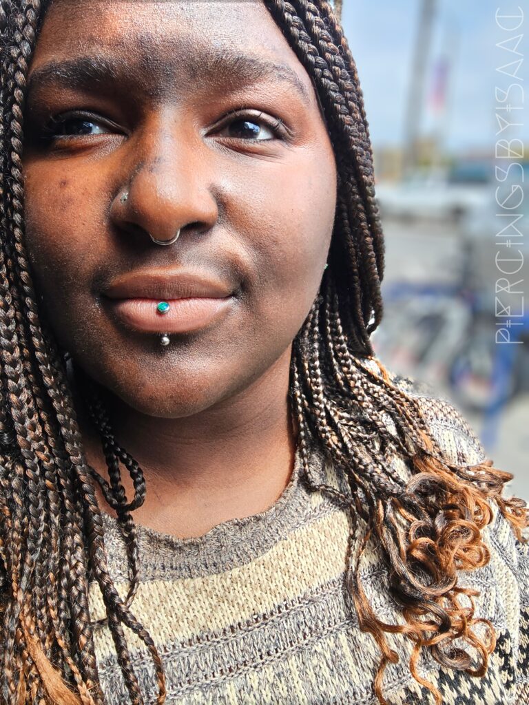 Labret lip piercing by Sideshow Tattoo and Piercing San Diego