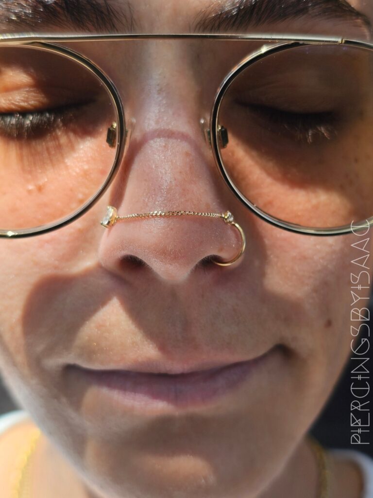 Nostril piercing with small stud at Sideshow Tattoo and Piercing San Diego