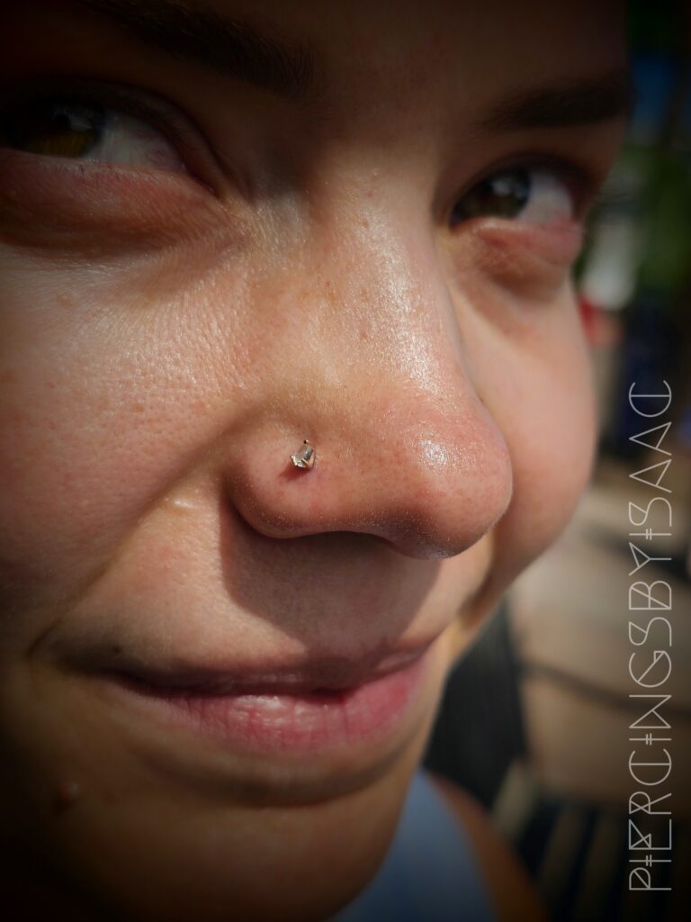 Nostril piercing close-up at Sideshow Tattoo and Piercing San Diego