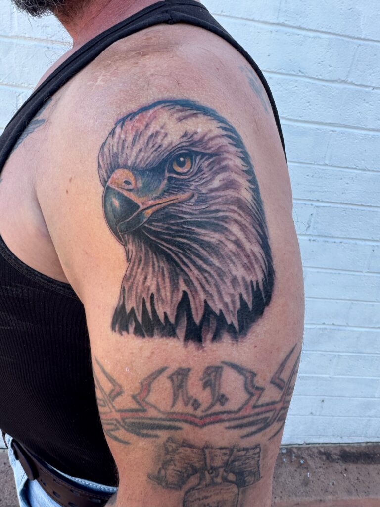 Realistic eagle shoulder tattoo by Sideshow Tattoo and Piercing San Diego