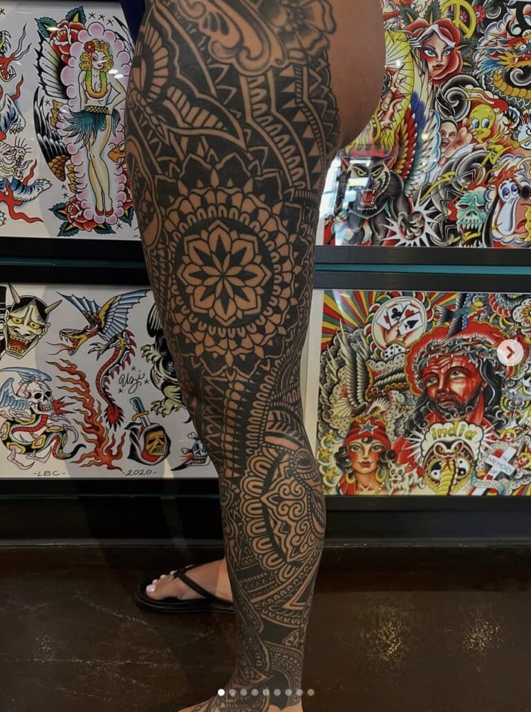 Intricate tribal tattoo on leg